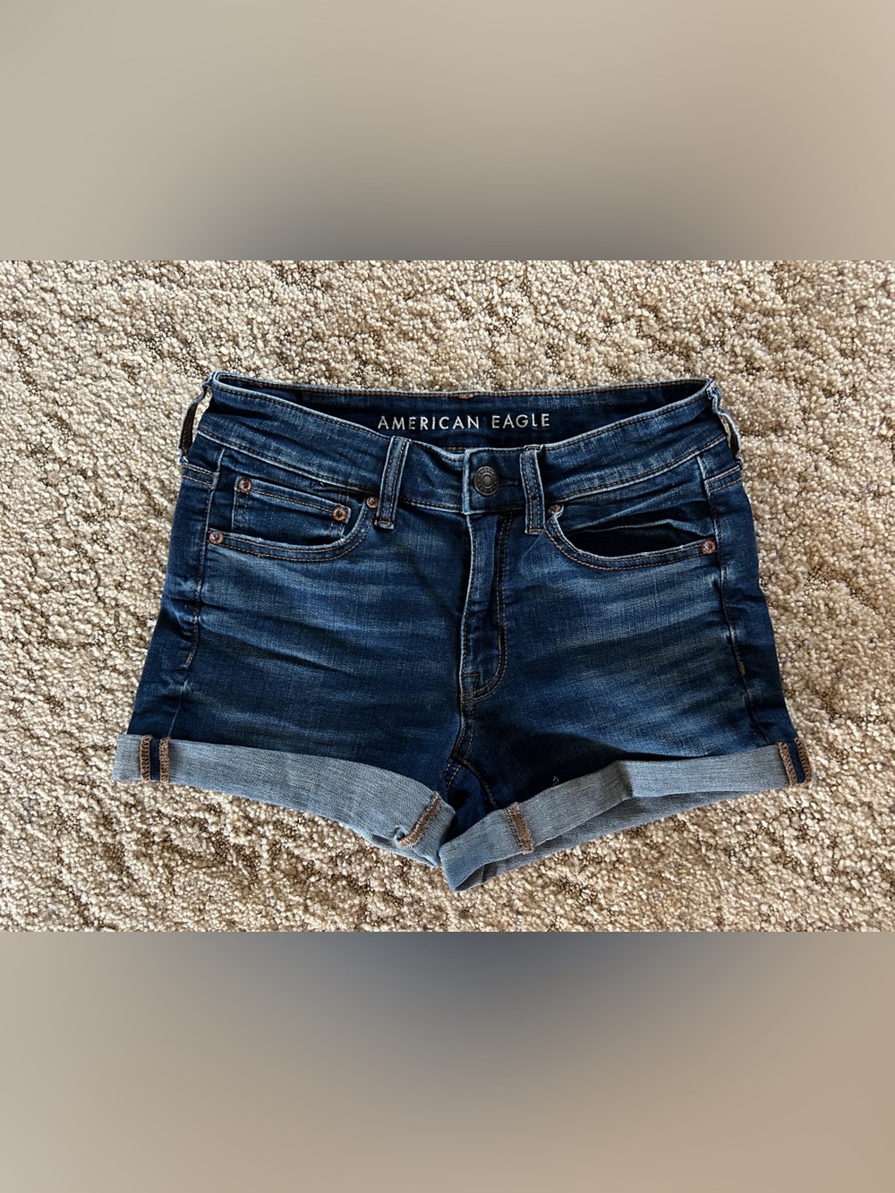 American Eagle Women’s Midi Denim Shorts. Dark wash, size 6. Rolled Cuff.